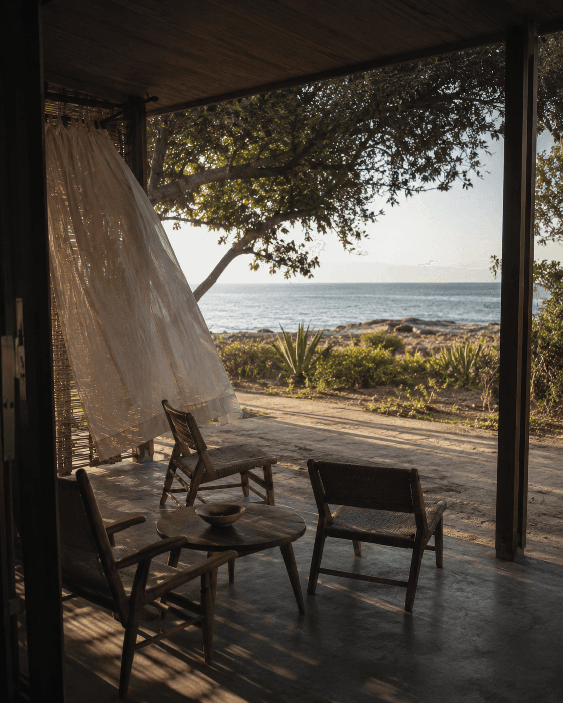 A single chair facing Lake Malawi at Cape Maclear